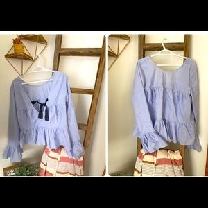 Light blue bell sleeve shirt
